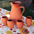 Terracotta Pitcher and Wine Cups